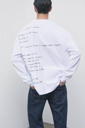 Bawełniany T-shirt oversize z długim rękawem i nadrukiem