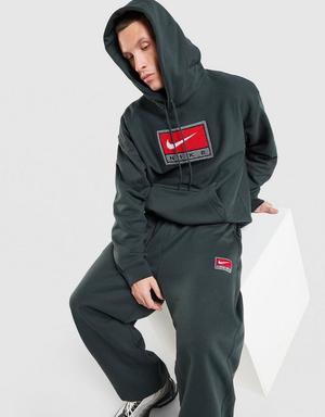 Nike Spodnie Nl Solo Swsh Bb Oh Gfx