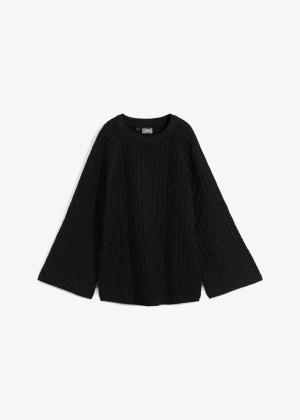 Sweter oversize w warkocze