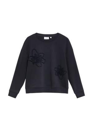 Bluza z kwiatową aplikacją