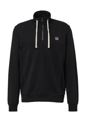 Bluza z rozciętymi kieszeniami i naszywką z etykietą
