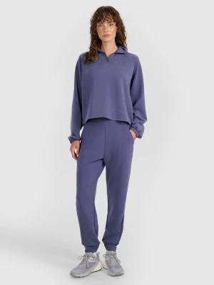 4F spodnie dresowe damskie z kieszeniami 4FWAW25TTROF1180 niebieskie (XXL)