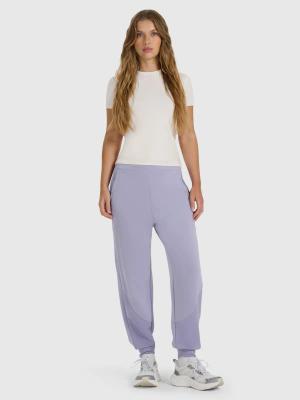 4F spodnie dresowe damskie z kieszeniami 4FWAW25TTROF1180 fioletowe (XL)