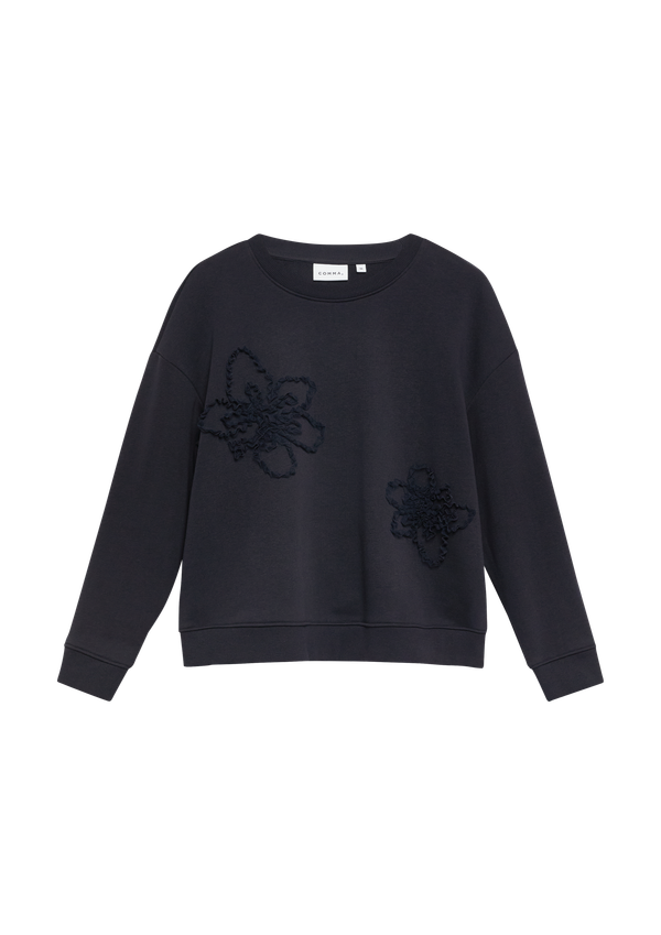 Bluza z kwiatową aplikacją