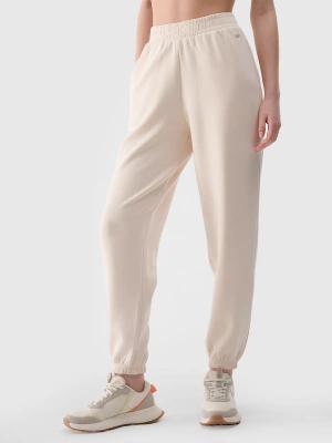 4F spodnie dresowe treningowe damskie 4FWSS25TTROF1010 beżowe (XS)