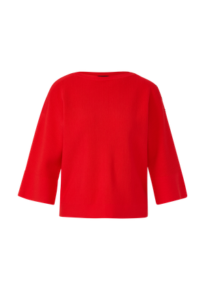 Sweter o luźnym kroju z ozdobnym zapięciem na guziki