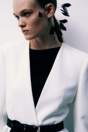 Ear cuff z piórami